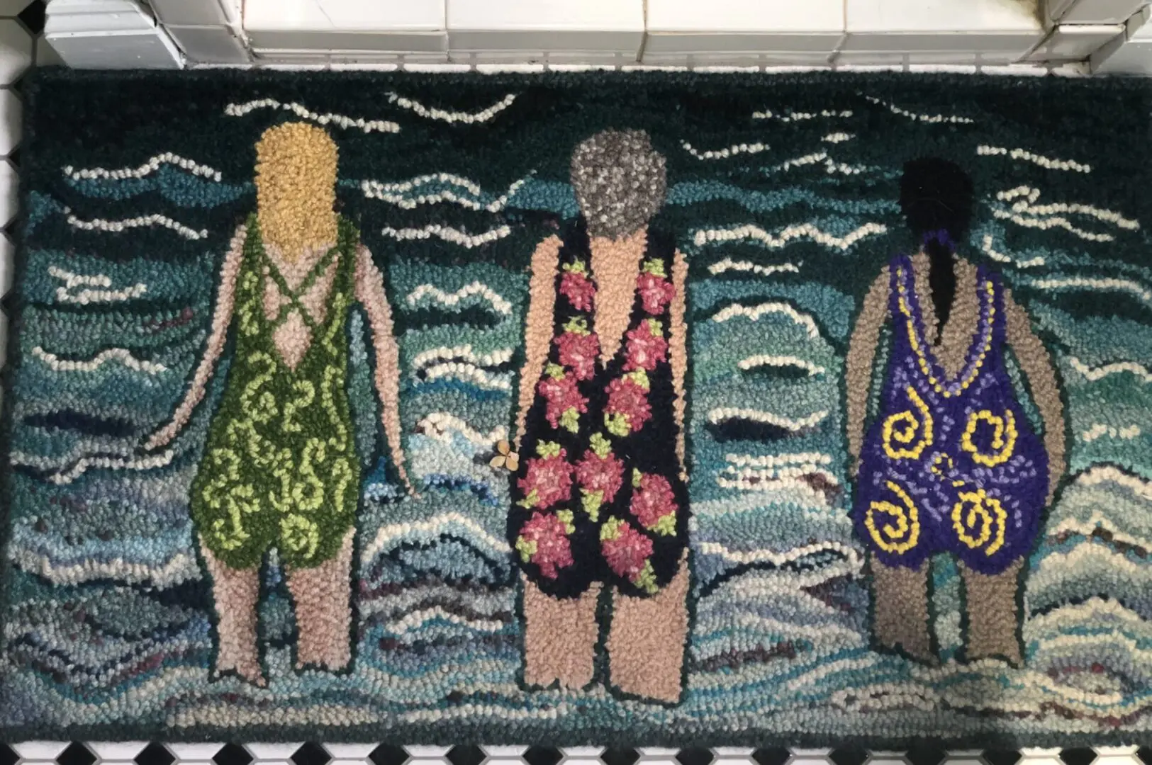 An artwork of women in swimsuits